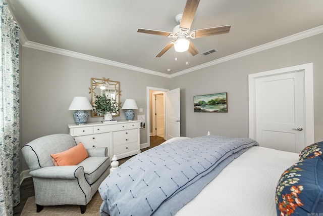 bedroom featuring ceiling fan and crown molding