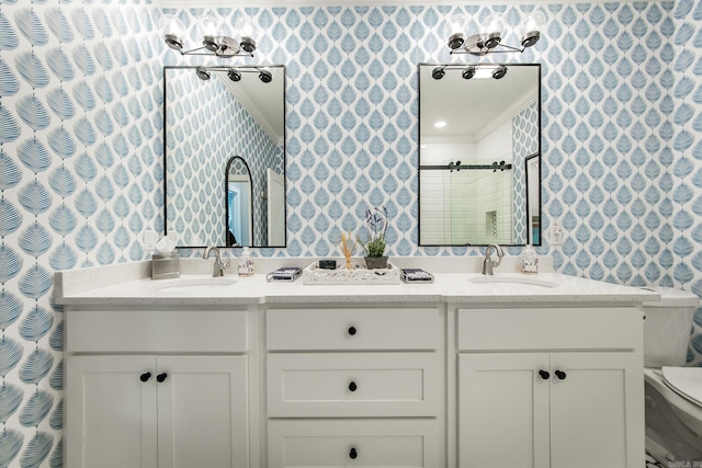 bathroom featuring a shower with shower door, toilet, ornamental molding, and vanity