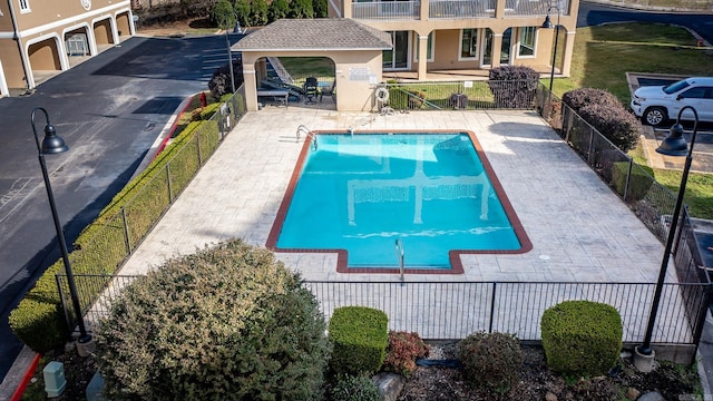 view of pool with a gazebo and a patio