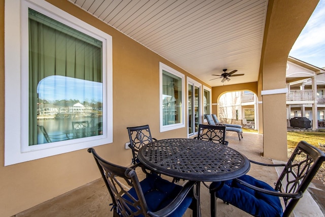 view of patio / terrace with grilling area and ceiling fan