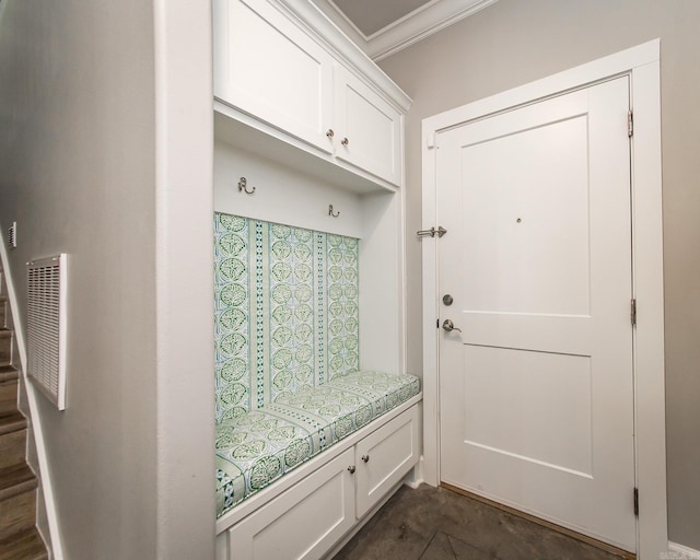 mudroom featuring crown molding