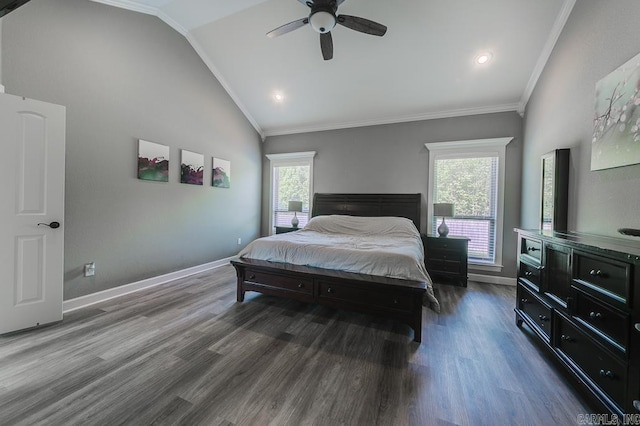 bedroom featuring multiple windows, dark hardwood / wood-style floors, ceiling fan, and lofted ceiling