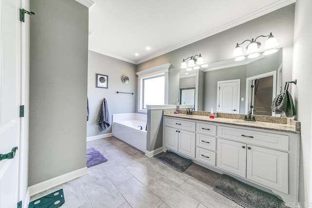 bathroom with a tub, tile patterned flooring, vanity, and ornamental molding