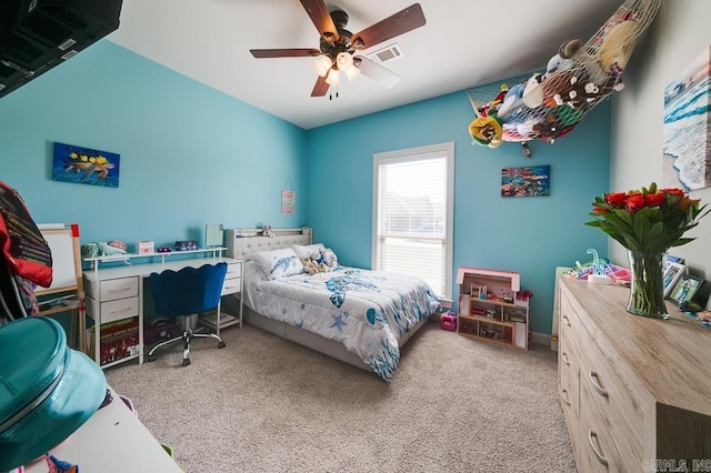 bedroom with light carpet and ceiling fan