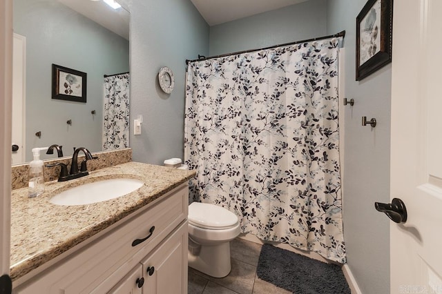 bathroom with tile patterned flooring, vanity, toilet, and a shower with curtain