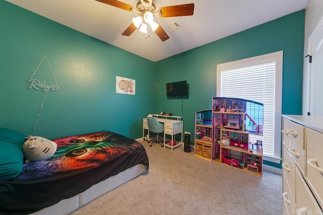 carpeted bedroom with ceiling fan