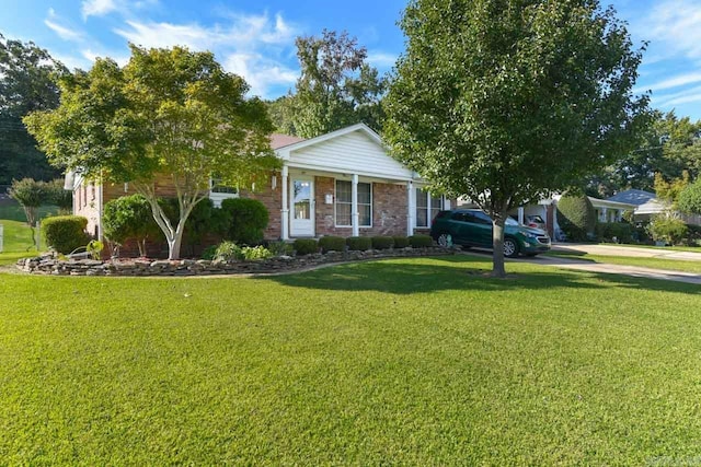 view of front of house with a front lawn