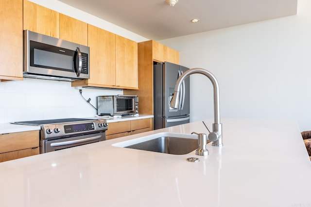 kitchen featuring sink and stainless steel appliances