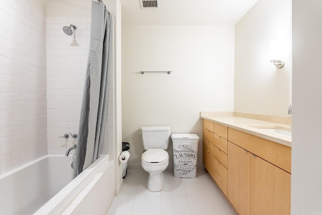 full bathroom featuring toilet, vanity, tile patterned floors, and shower / bathtub combination with curtain