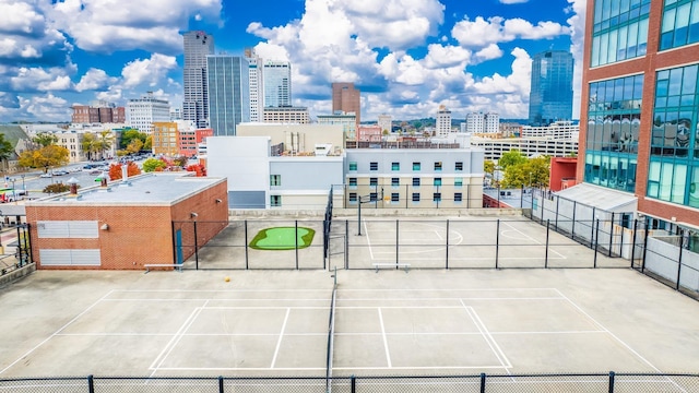 exterior space featuring tennis court