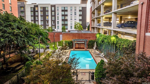 view of pool featuring a patio