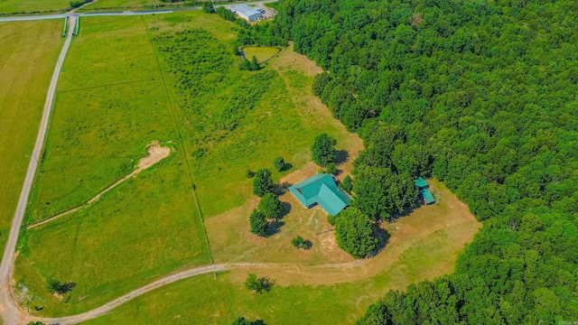 birds eye view of property with a rural view