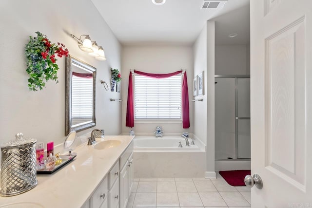 bathroom with separate shower and tub, tile patterned flooring, and vanity