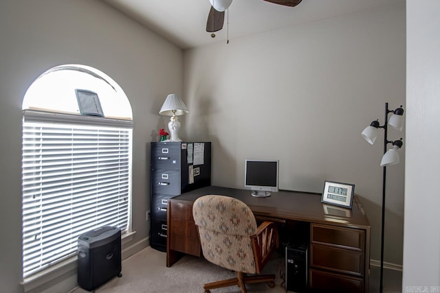 office with ceiling fan, a healthy amount of sunlight, and light colored carpet