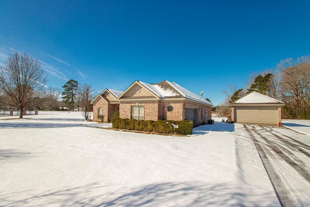 ranch-style home featuring a garage