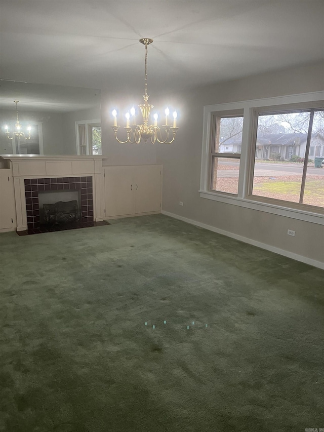 interior space with a fireplace, carpet floors, and a chandelier