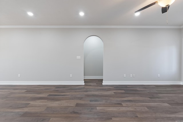 unfurnished room with ceiling fan, ornamental molding, and dark wood-type flooring