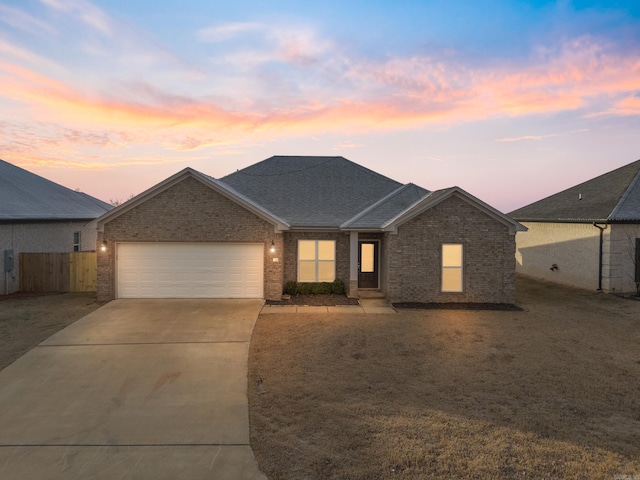 view of front of property featuring a garage