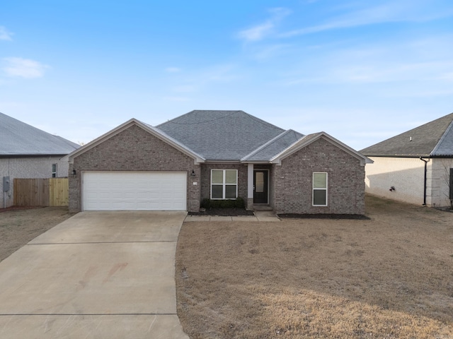 ranch-style house featuring a garage