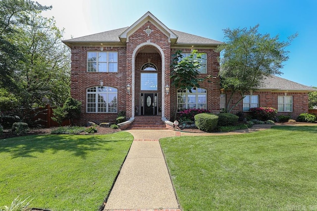 view of front of property with a front lawn