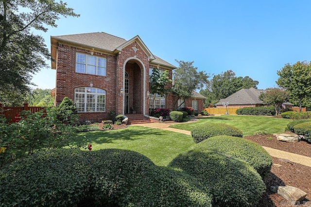 view of front facade with a front lawn