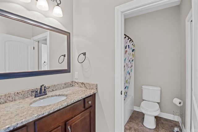 full bathroom featuring shower / bath combo, toilet, and vanity