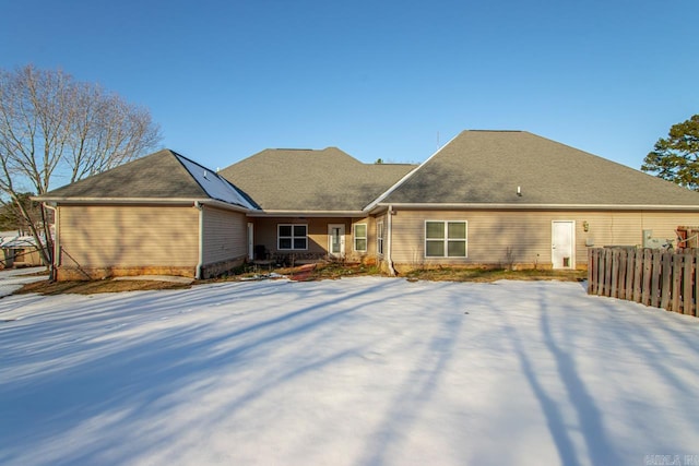 view of snow covered property