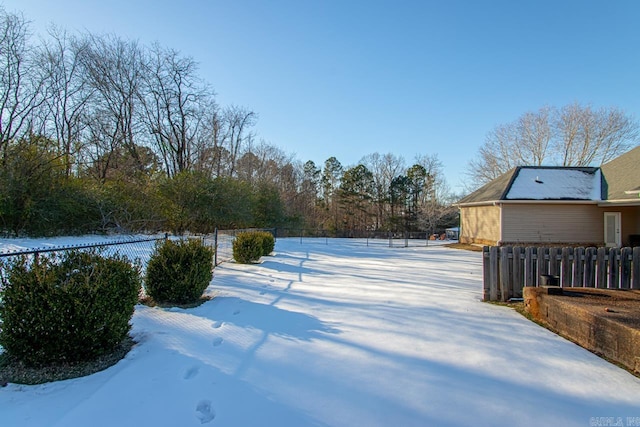 view of yard covered in snow