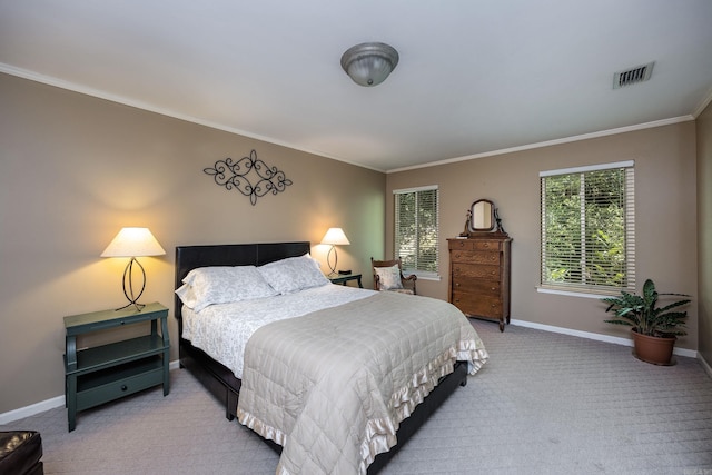 bedroom with crown molding, light carpet, and multiple windows