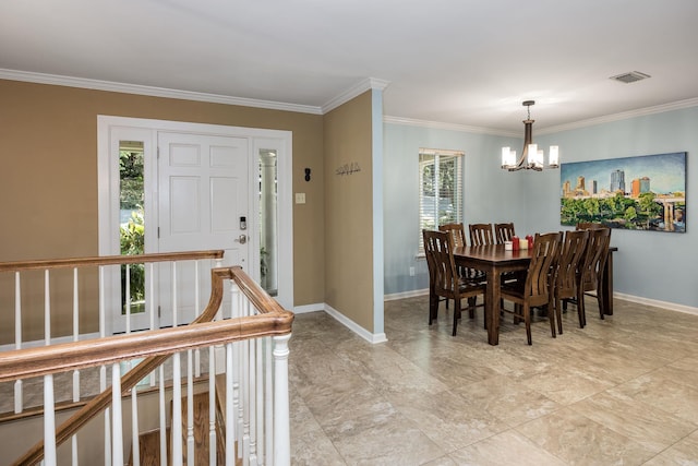 dining area with a healthy amount of sunlight, a chandelier, and ornamental molding