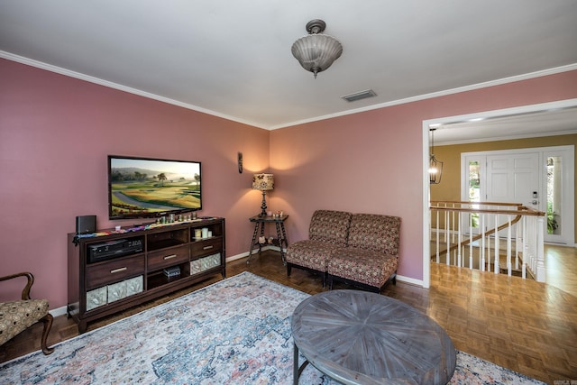 living room with parquet flooring and crown molding