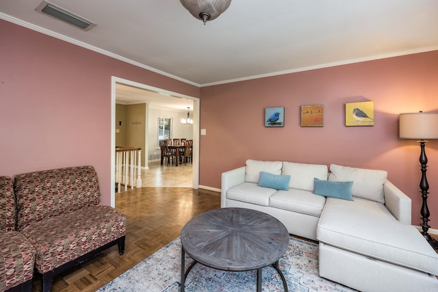 living room featuring parquet flooring, crown molding, and a notable chandelier