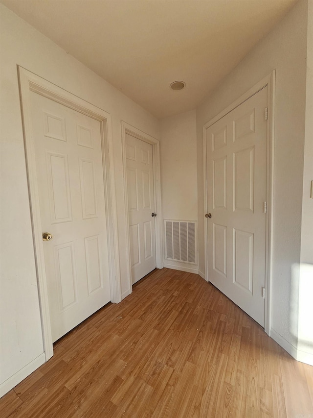 unfurnished bedroom with light hardwood / wood-style flooring