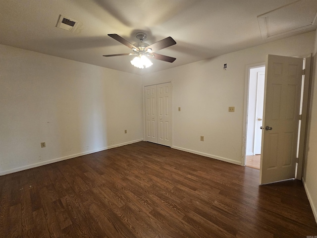 unfurnished room featuring dark hardwood / wood-style flooring and ceiling fan