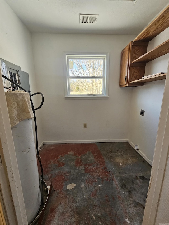 washroom featuring cabinets and electric dryer hookup