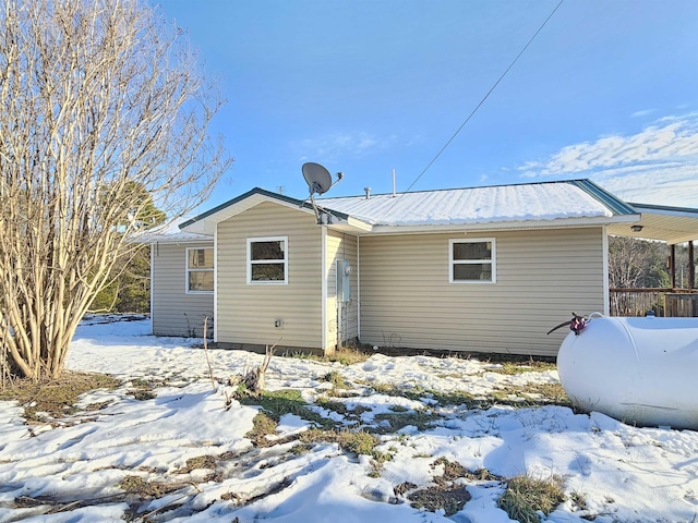 view of snow covered property