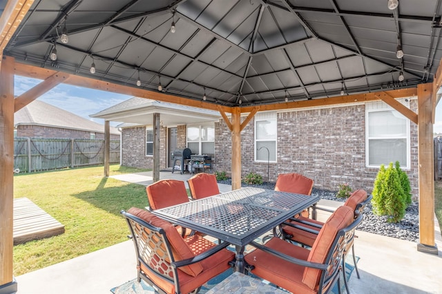 view of patio with a gazebo and area for grilling