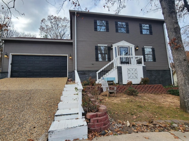 colonial home featuring a garage