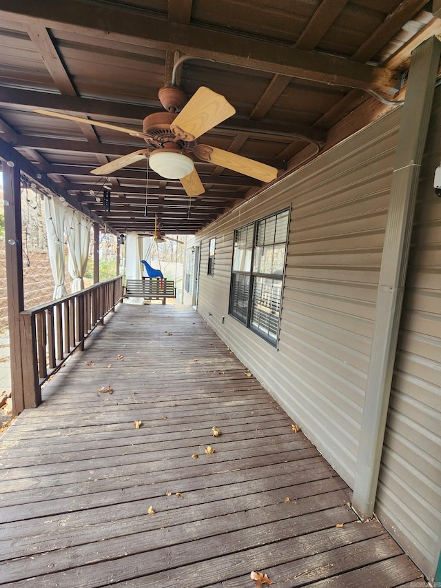 wooden terrace with ceiling fan