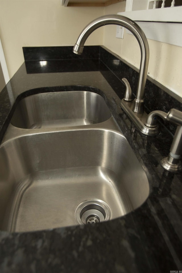 details with sink and dark stone counters