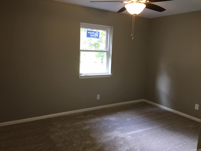 unfurnished room with carpet floors and ceiling fan