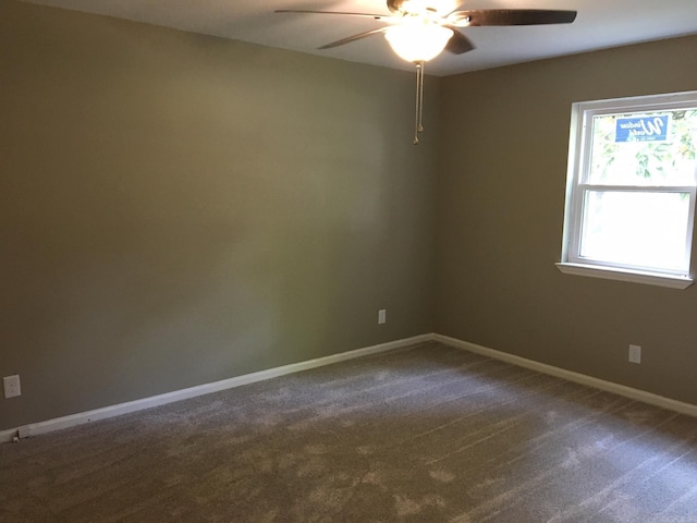 carpeted empty room with ceiling fan