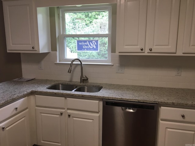 kitchen with white cabinets, dishwasher, a healthy amount of sunlight, and sink