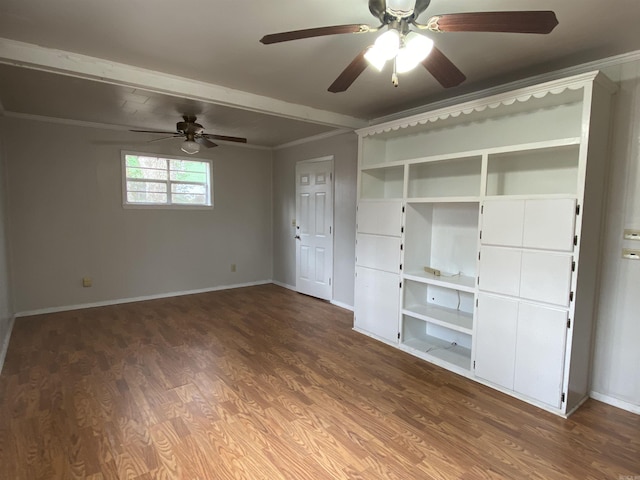 unfurnished bedroom with ornamental molding, wood finished floors, and baseboards