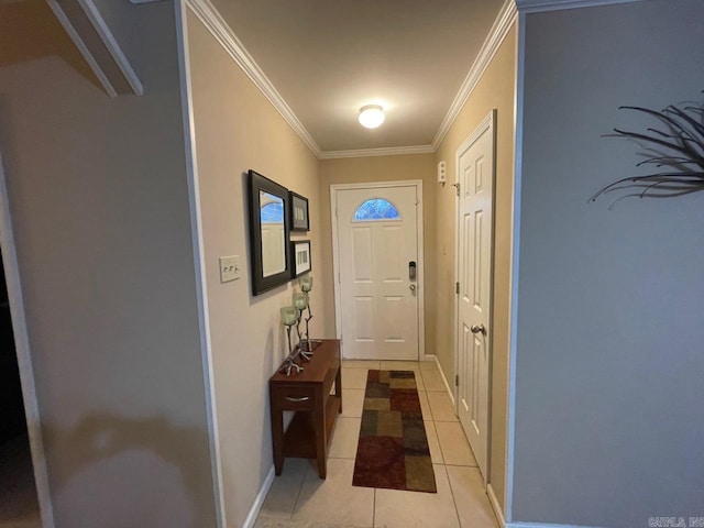 doorway with crown molding and light tile patterned floors