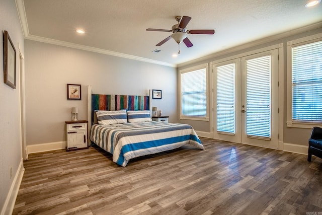 bedroom with access to outside, french doors, crown molding, ceiling fan, and wood-type flooring