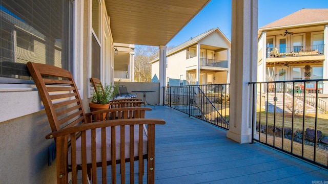 balcony featuring ceiling fan