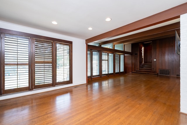 unfurnished room featuring hardwood / wood-style floors