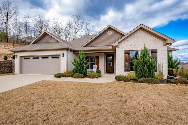 view of front facade with a front lawn and a garage