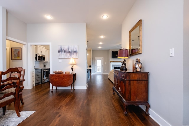 hall featuring dark hardwood / wood-style floors